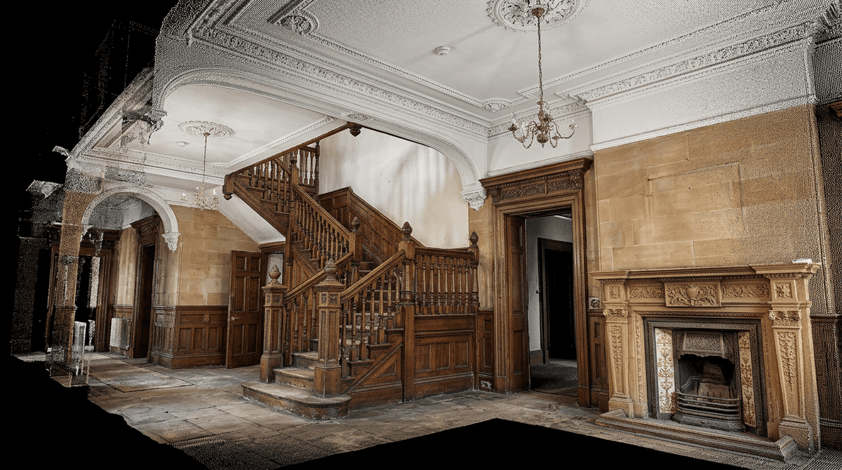 Colourised 3D point cloud of a building interior showing walls, cornicing, fireplace, and staircase captured by LiDAR scanning
